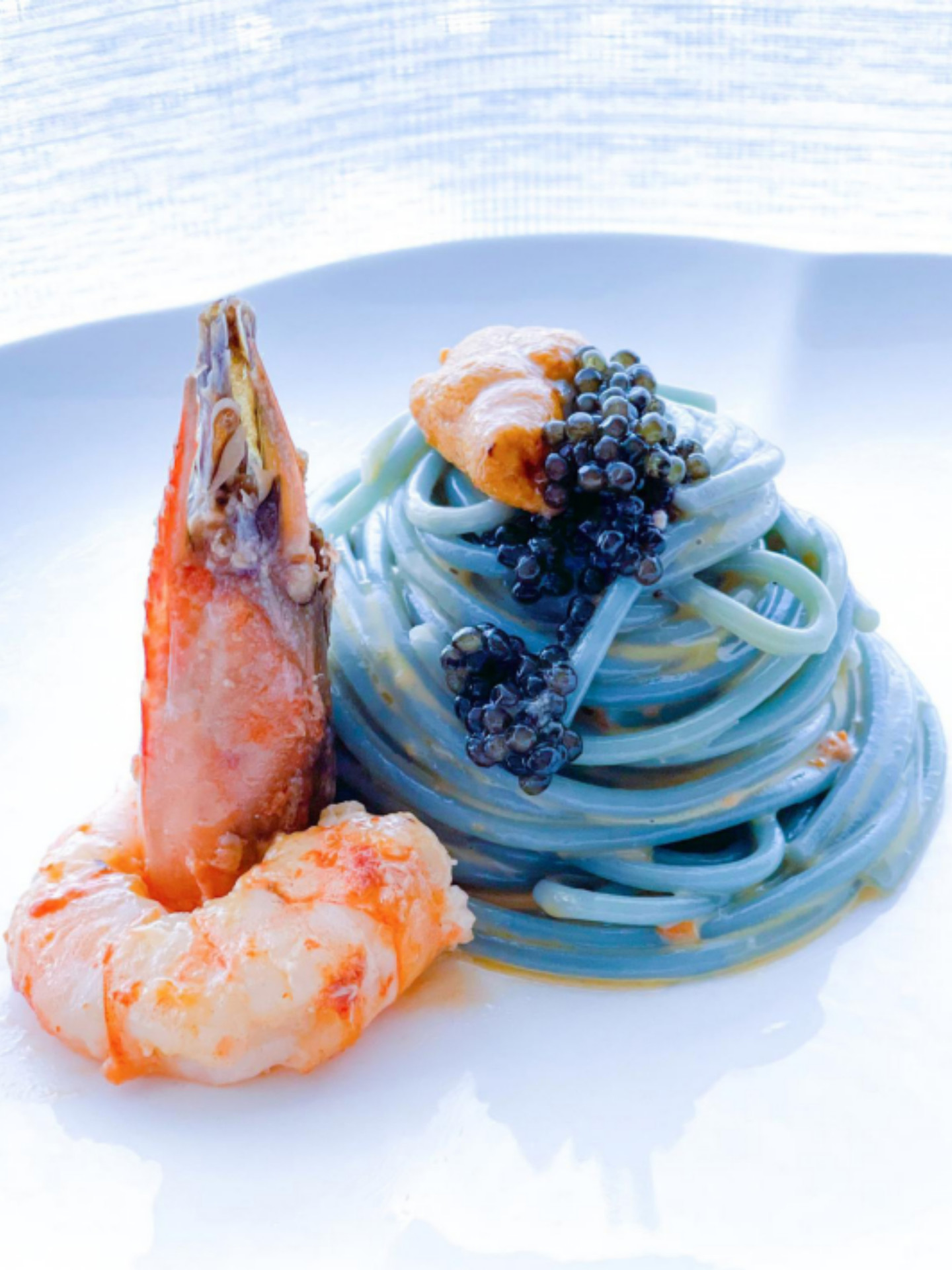 Spaghetti alla spirulina con ricci di mare, gamberi di Mazara e caviale 74 Progetto senza titolo 3 1 | Casa Rustichella